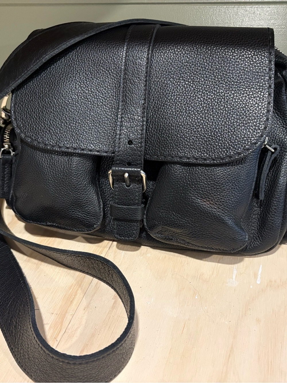 Roots cross body leather bag
